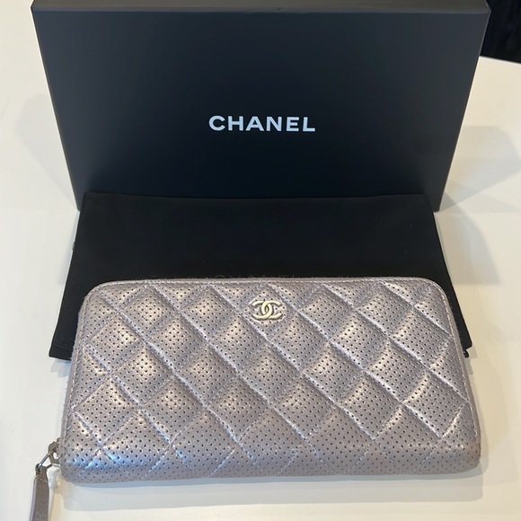 CHANEL Handbags - 🔥RARE CHANEL IRIDESCENT SILVERY/PURPLE ZIP AROUND WALLET FULL INCLUSION 🔥
